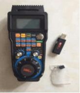 MACH 3 controller with display screen, colorful interface, USB dongle, and accessories for CNC machine operations on a white background.