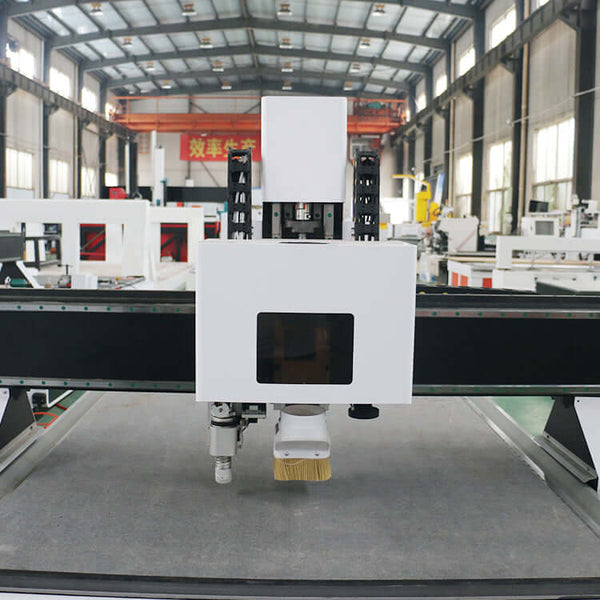 CNC router with oscillating knife for precise cutting of wood, fabric, and rubber in an industrial setting.